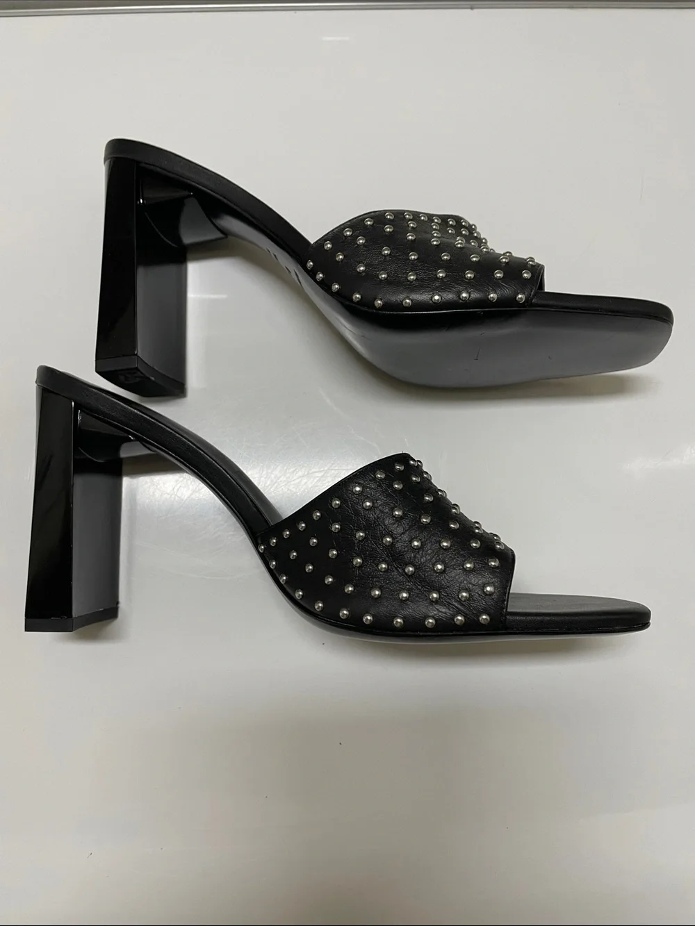 Reformation heels, or slides